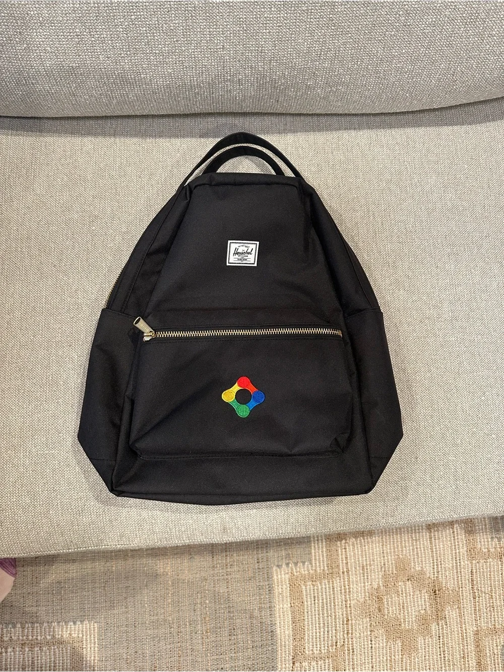 Black Herschel Backpack with Colorful Patch